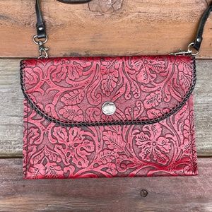Red leather handcrafted artisan tooled crossbody purse with buffalo coin snap